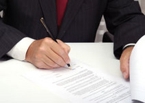 Man signing document